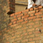 plumb line on a brick wall