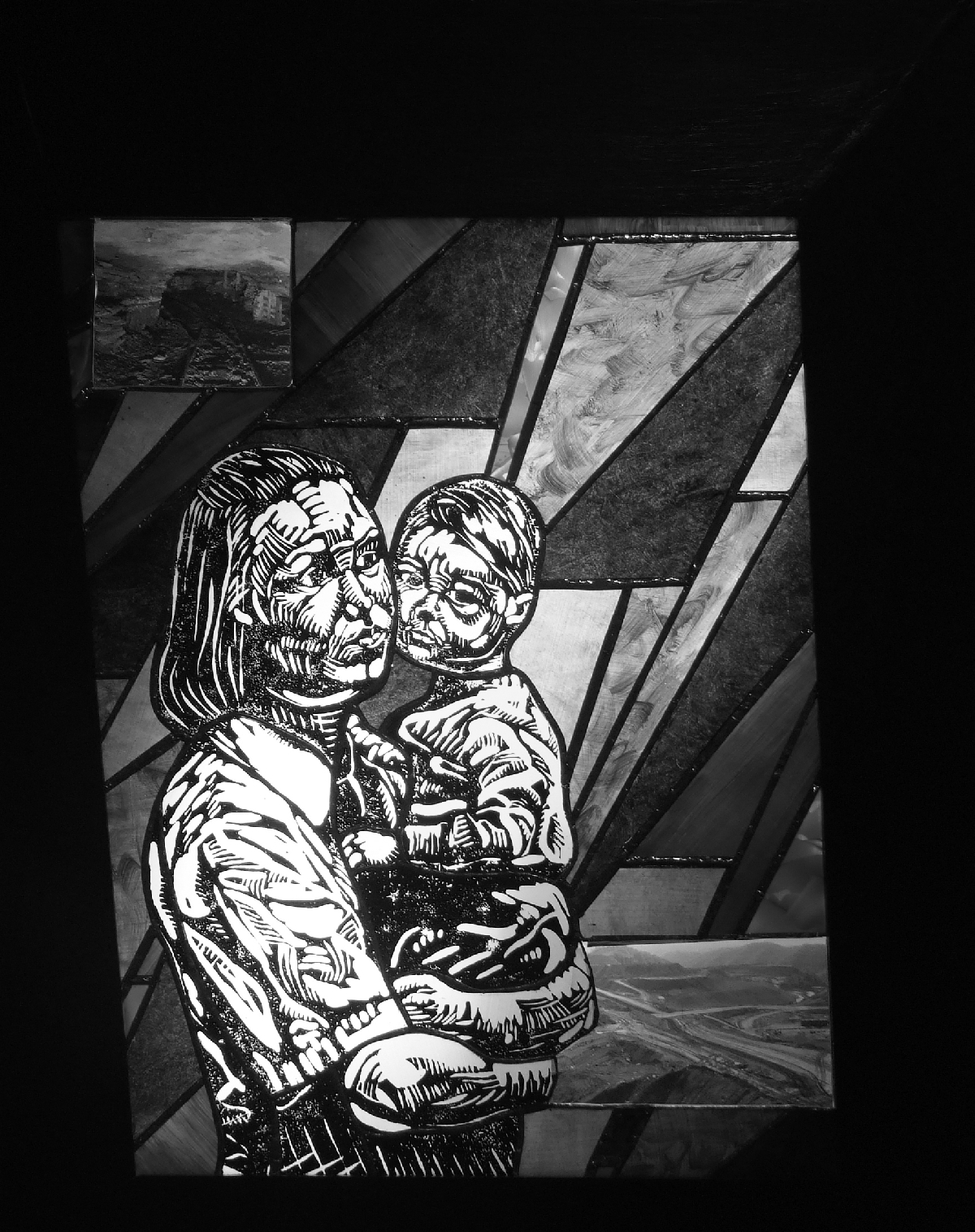 stained glass picture of mother and child