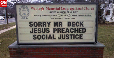 sign saying jesus preached social justice
