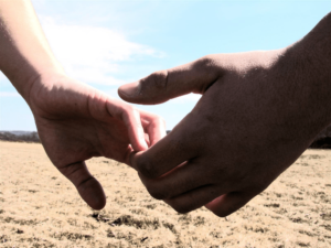 photo of hands touching