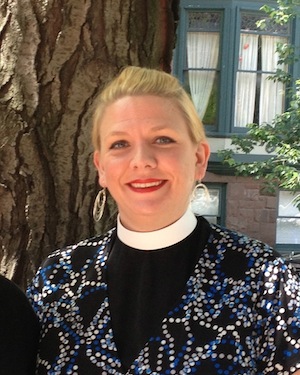 Rev. Stacey Midge of the Reformed Church in America, wearing her clerical collar